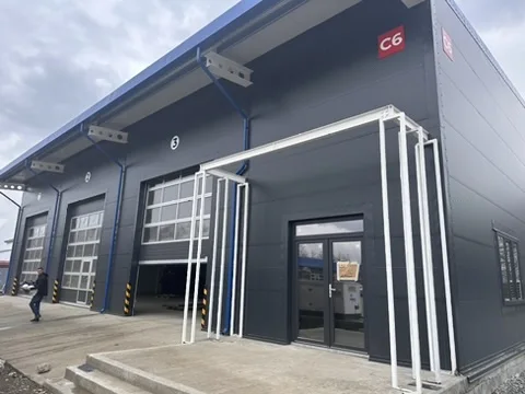 HALE DELTA INTERNATIONAL CONSTANȚA - fatada hala C6 cu copertina metalica
